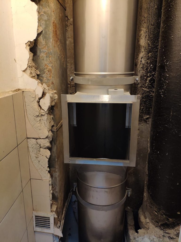 איסוף זבל דרך פיר בבנייני מגורים גבוהים